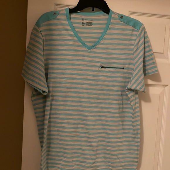 INC International Concepts Other - Nice v-neck INC tee with pocket zipper and buttons on shoulder!